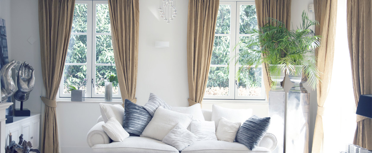 Living room with gorgeous windows.