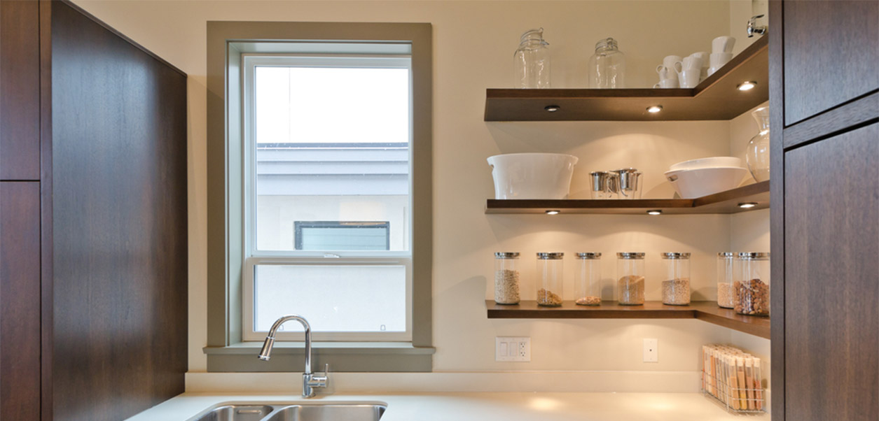 Clean modern kitchen with windows.