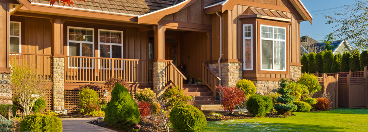 Picture of beautiful brown siding during fall.