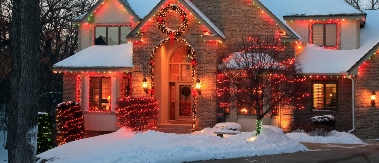 Decorate the exterior of your home for the holidays, here is a home with holiday lights at night.