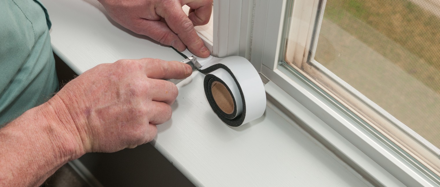 Weather stripping a window seal.