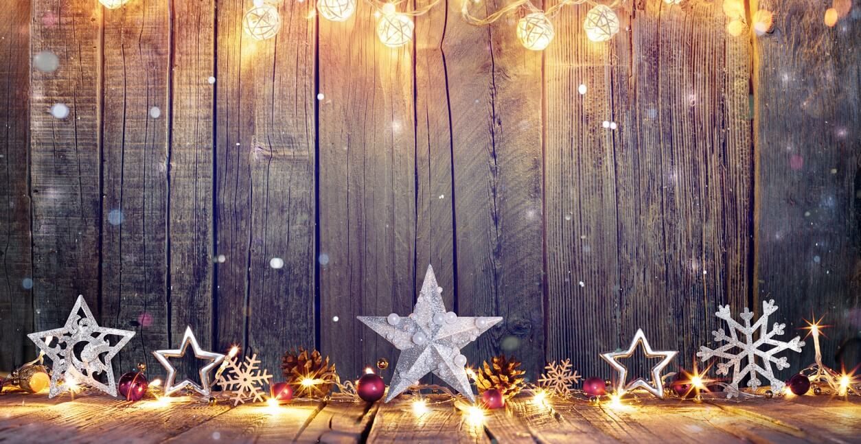 A wood background with Christmas lights for your door or window project.