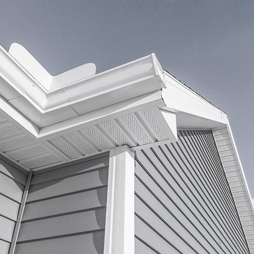 Image of a house with eavestrough, soffit and fascia in focus