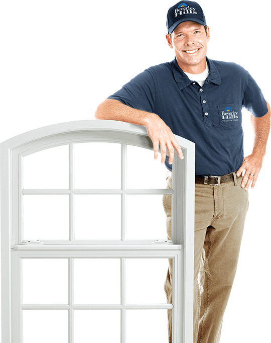 An image of a Beverley Hills Window Installer leaning on a casement window.