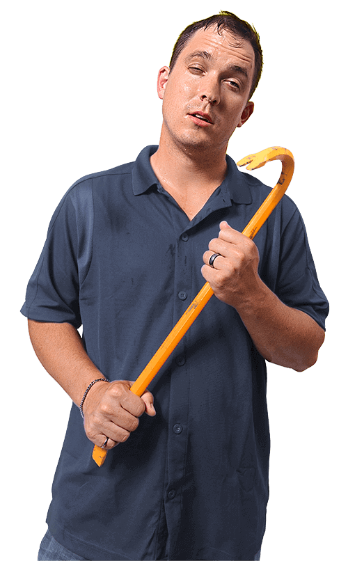 A young man holding a crowbar looking tired after struggling with his difficult windows.