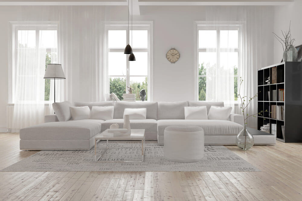 Beautiful living room with large PVC replacement windows.